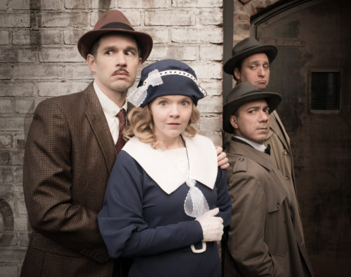 Mile Square Theatre’s production of The 39 Steps, with (L to R) Joe Delafield, Alycia Kunkle, Evan Zes, and Zachary Fine. Photo by Craig Wallace Dale.